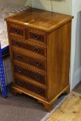 Slim yew crossbanded chest of two short above four long drawers, 82.