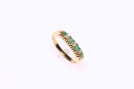 Emerald and diamond gold ring