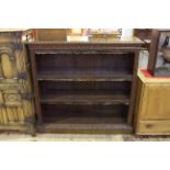 Victorian carved oak open bookcase having two adjustable shelves,