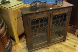 Old Charm oak two door leaded glass bookcase, 92cm by 94.