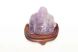 Chinese lavender quartz buddha on stand,
