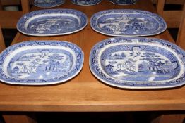 Four willow pattern meat plates