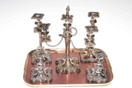 Silver plated candelabra and two pairs of silver plated candlesticks