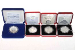 Four silver proof crown coins, 1981 Royal wedding, 1993 anniversary,