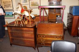 Edwardian mahogany three drawer bureau, walnut sliding glazed door bookcase, Singer sewing machine,