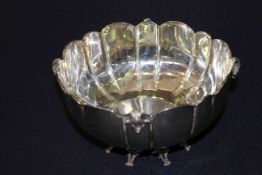 Continental silver bowl of panelled form and with pierced elegant feet, 20cm diameter,