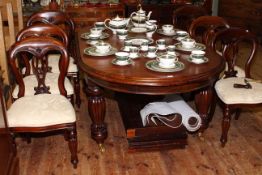 Victorian style oval mahogany extending dining table and two leaves together with six balloon back