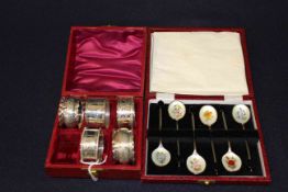 Collection of six silver napkin rings with engraved decoration and cased enamel on silver coffee
