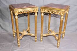 Pair gilt side tables with marble inset tops,