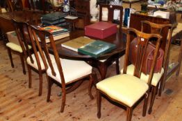 Mahogany and brass inlaid pedestal dining table and leaf together with eight inlaid dining chairs