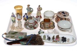 Tray of collectables including figures, horn beaker, cabinet cups and saucers, fan,