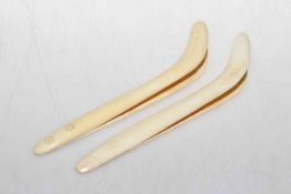 Two pair of antique ivory nippers