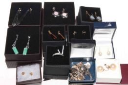 Collection of boxed jewellery including silver charm bracelet and gold earrings