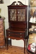 Edwardian mahogany Chippendale style cabinet having two astragal glazed doors above two drawers on
