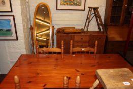 Pine rectangular dining table, four rush seated chairs,