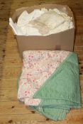 Box of assorted linen and paisley quilt