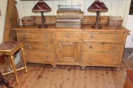 Victorian pine seven drawer dresser on turned legs with associated back,