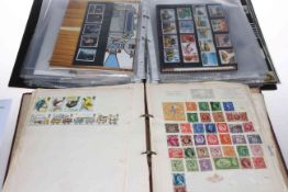 Worldwide stamp album plus British mint stamps including Coat of Arms, Russia circa 1890's,