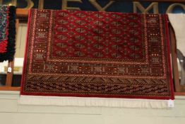 Bokhara rug with a red ground 1.90 by 1.