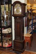 Early 20th Century carved oak triple weight longcase clock having arched brass and silvered dial