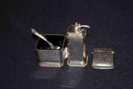 Engraved silver vesta case, silver pepperette and open salt,