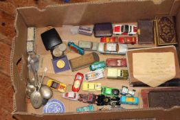 Box of toy cars, coins, medals, books,