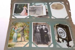 Worn postcard album including Louis Wain, Middleton in Teesdale, Tea Tent High Force Show 1912,