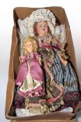 Two dolls in period costume