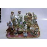 Collection of Victorian bisque figures, including tennis players,