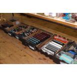 Seven boxes of model railway accessories including controllers, rolling stock, track, etc.