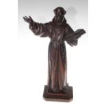 Carved wood sculpture figure of religious preacher, holding open book with arm outstretched, 52cm.