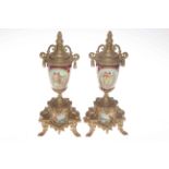 Pair of Vienna style vases with metal mounts, 33cm.