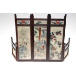 Japanese table screen, having glazed panels with fabric painted with figure and birds, 40cm high.