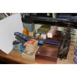 Model galleon, tinplate airplane, robot and drummer on horseback, various boxes, children's books,