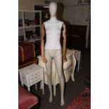 Vintage life size mannequin, made from composite, paper covered and wood arms.
