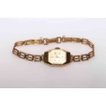 Ladies 9 carat gold bracelet watch.