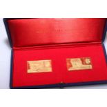 Cased pair of 18 carat gold Sir Winston Churchill stamp replicas with certificates.