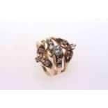 Unusual design triple shank diamond ring, size K½.