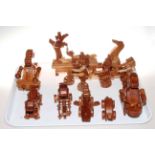 Chester Wedgwood carved wood toys: Cycling trio, two dinosaur drummers, fox and crow,