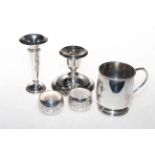 Five pieces of silver, Birmingham 1909 candle holder, Christening mug Birmingham 1947,