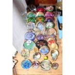 Collection of Caithness and other paperweights.