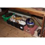 Three boxes of china, tools, folding brass table, picnic set, dolls, teddy, brass jam pan, etc.