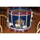 Blue, red and white wooden drum, 48cm.