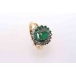 18 carat yellow gold, emerald and diamond cluster ring,