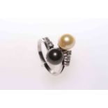 Two tone pearl and diamond twist set ring, size N.
