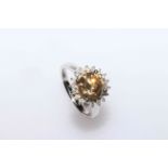 14 carat White Gold Diamond ring featuring centre, round brilliant cut, cognac Diamond (2.