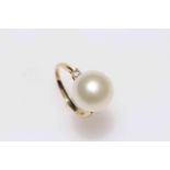 14 carat Yellow Gold Pearl and Diamond ring featuring, one white Cultured South Sea Pearl,