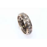 9 carat gold and silver eternity ring.