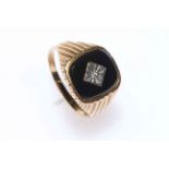 9 carat gold Gents black onyx and small diamond ring.