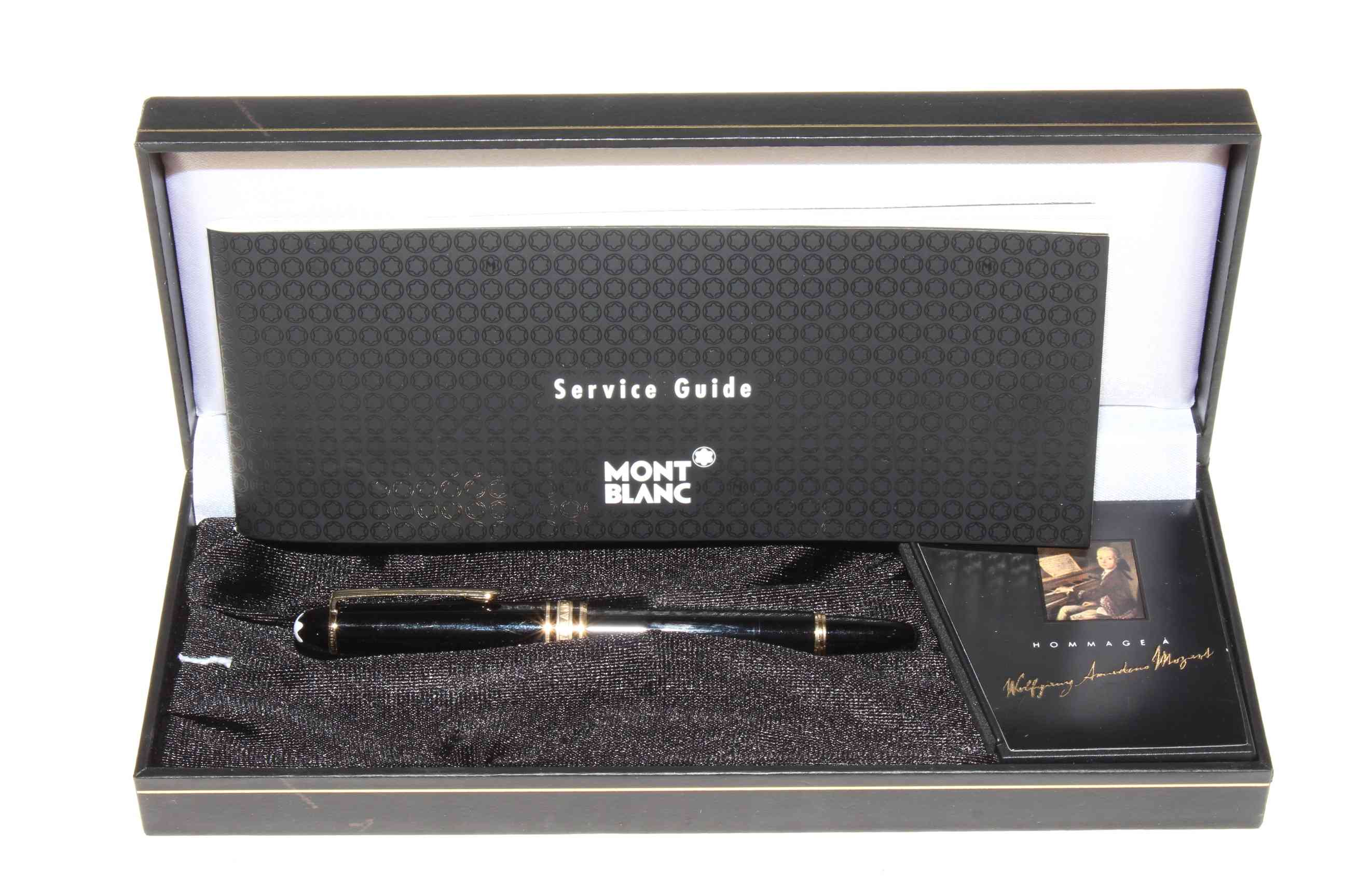 Ladies Mont Blanc fountain pen in original box with service guide.